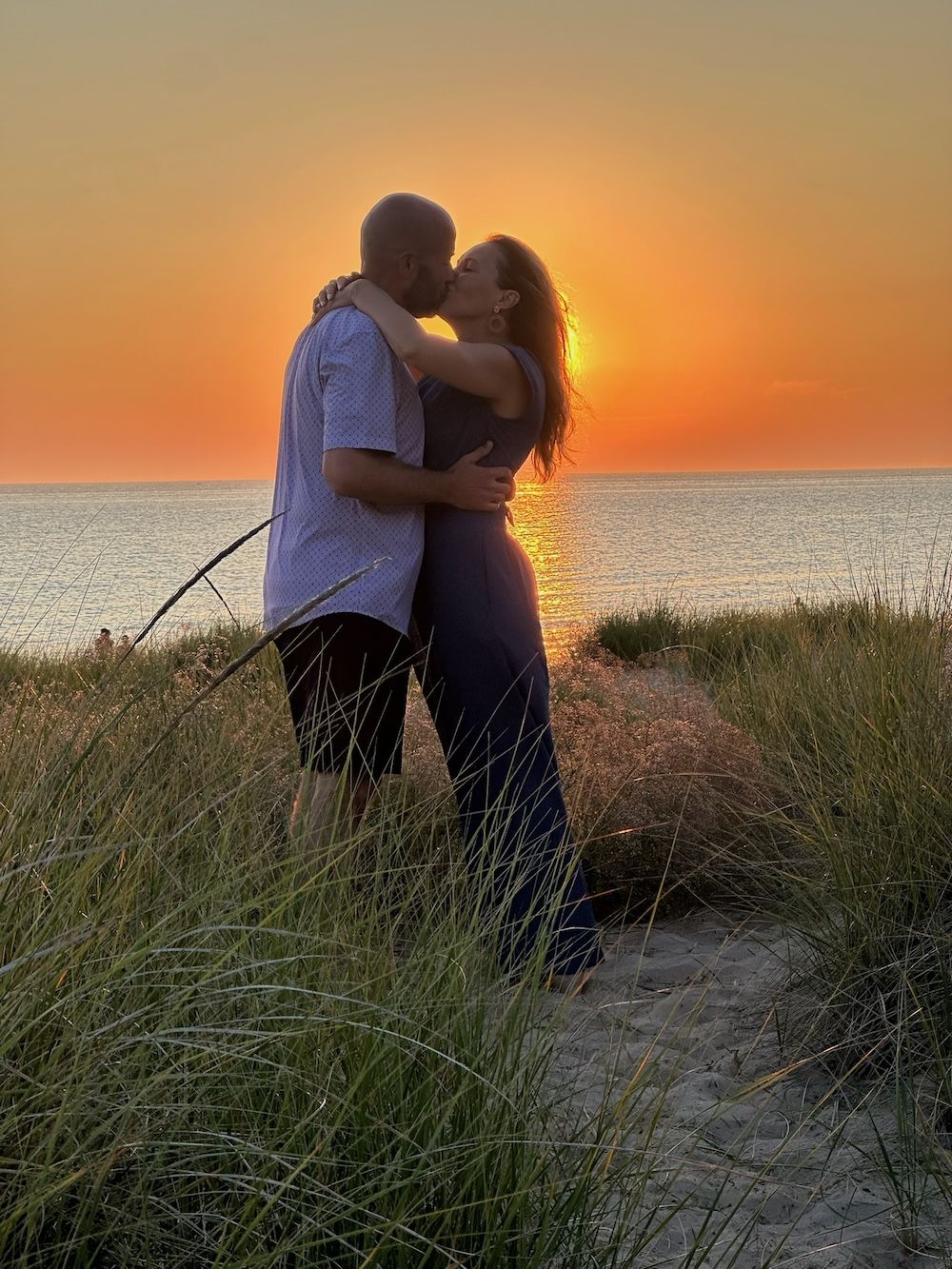 beach sunset frankfort michigan engagement proposal 