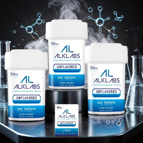 Three containers of ALKLABS unflavored tablets on a lab table.