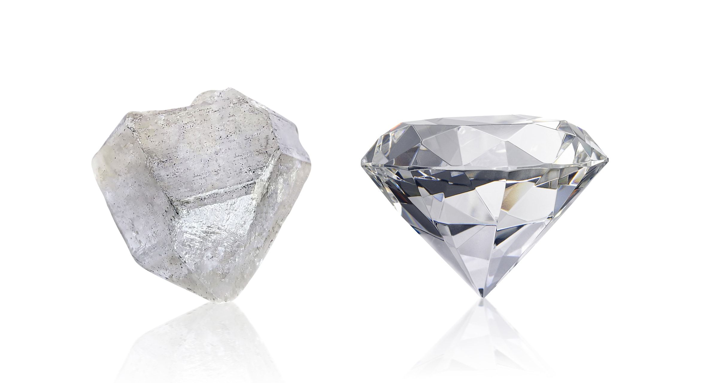 rough diamond with polished diamond next to it