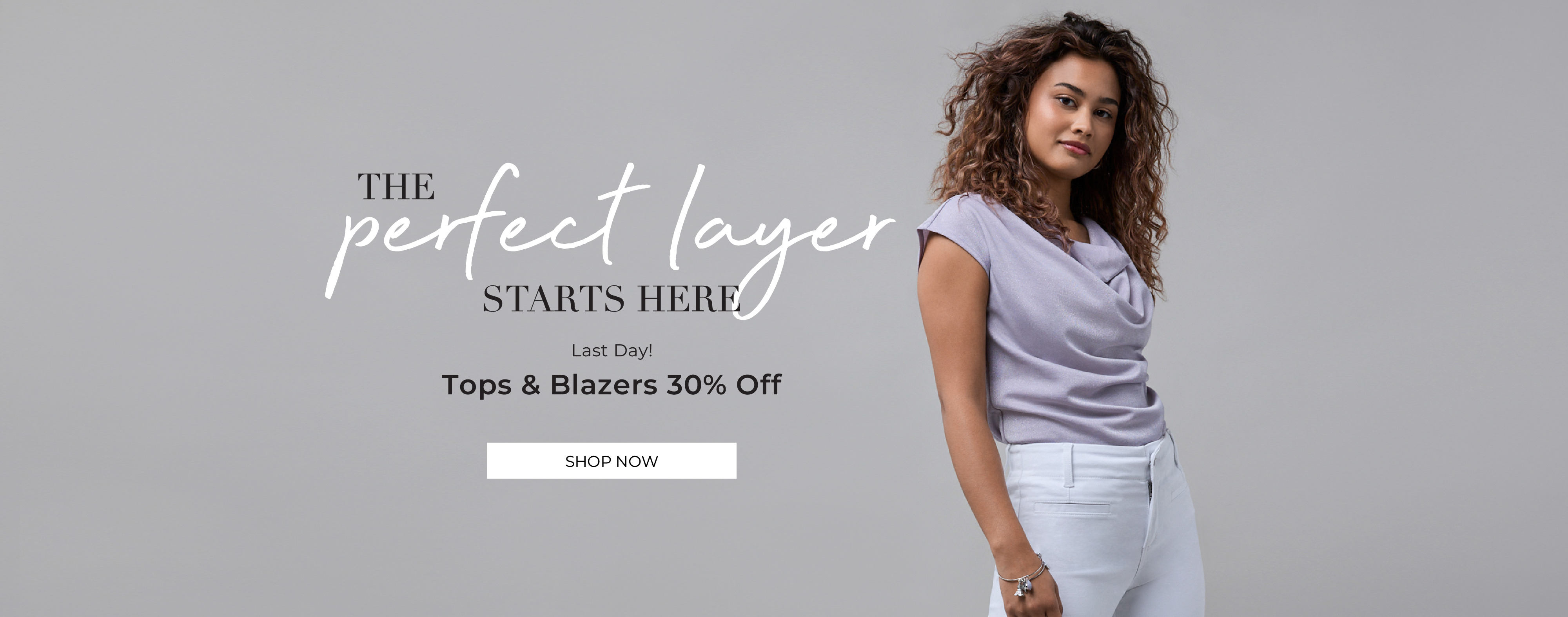 Woman in stylish outfit promoting layering fashion, tops and blazers 30% off.
