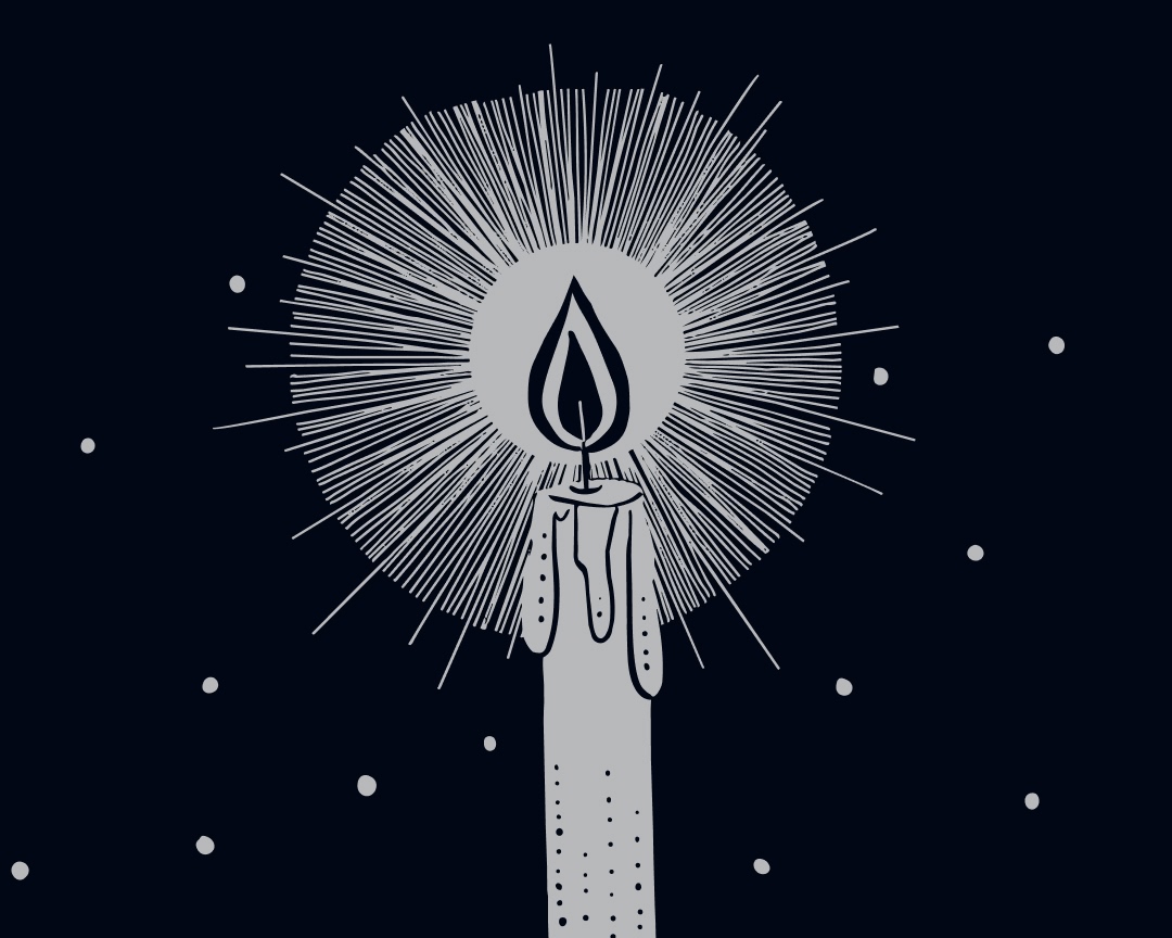 A hand holding a candle with a glowing flame against a dark background.