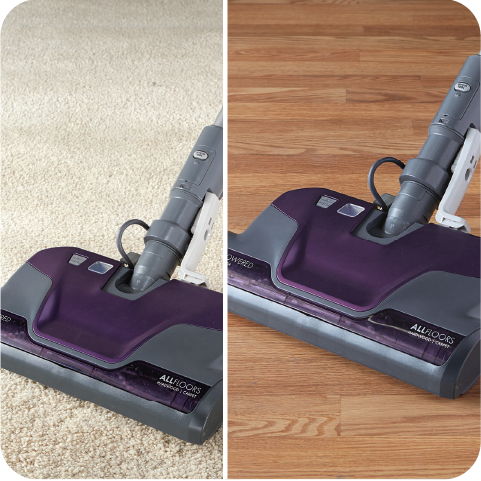 Vacuum cleaner shown on carpet and hardwood floor.