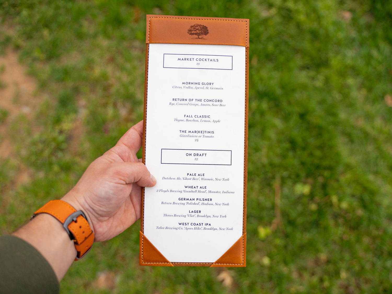 WOODEN MENU WITH LEATHER ACCENT