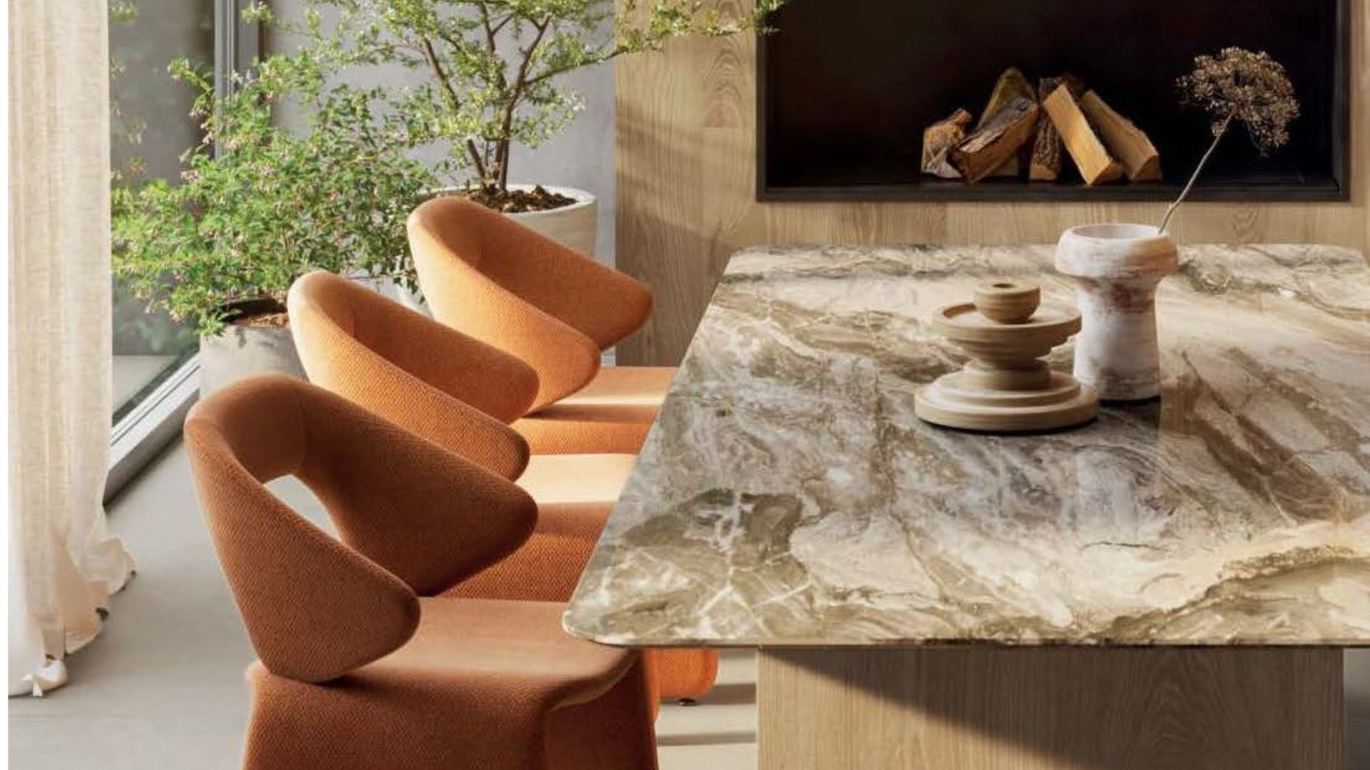 Modern dining area with stylish chairs, marble table and wood effect Allluslate wall panels.