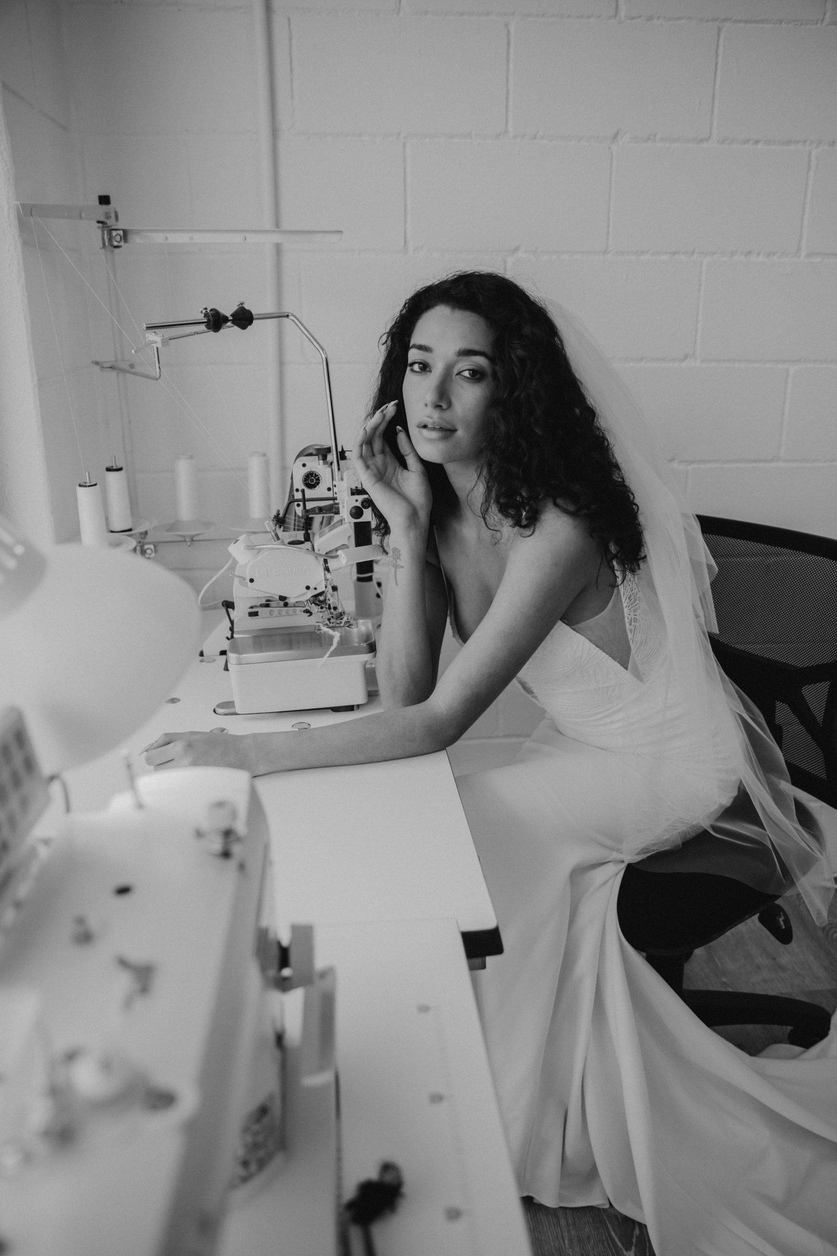 Human mannequin in the Grace Loves Lace studio at production table