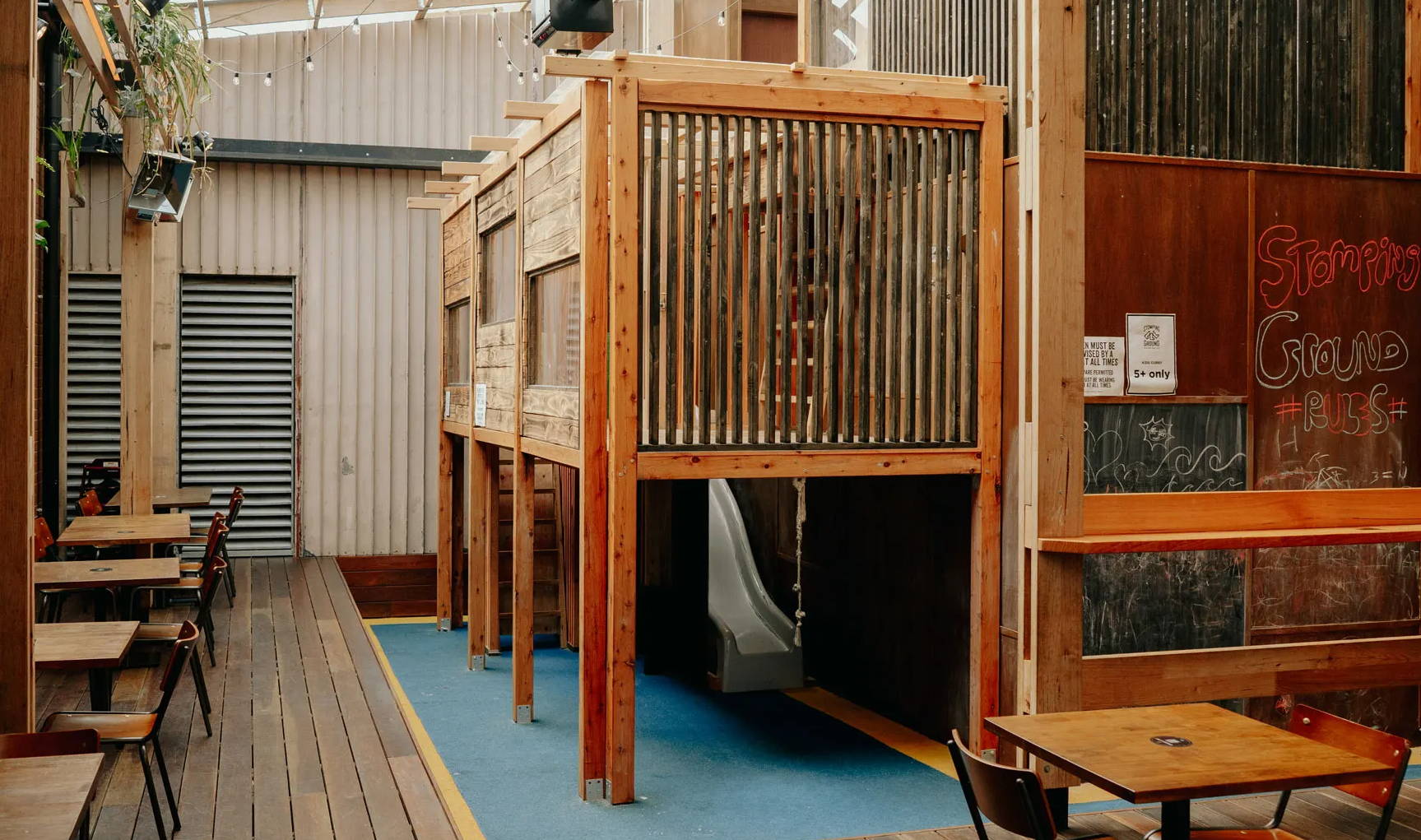 An internal wooden playground for commercial customer
