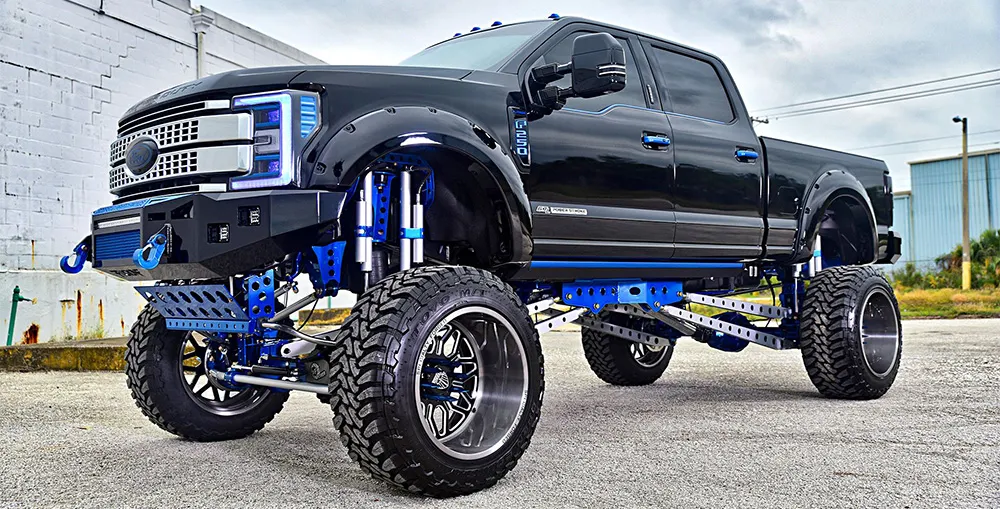 Jeff's lifted black 2017 Ford F250 Super Duty with blue suspension and chrome off-road wheels