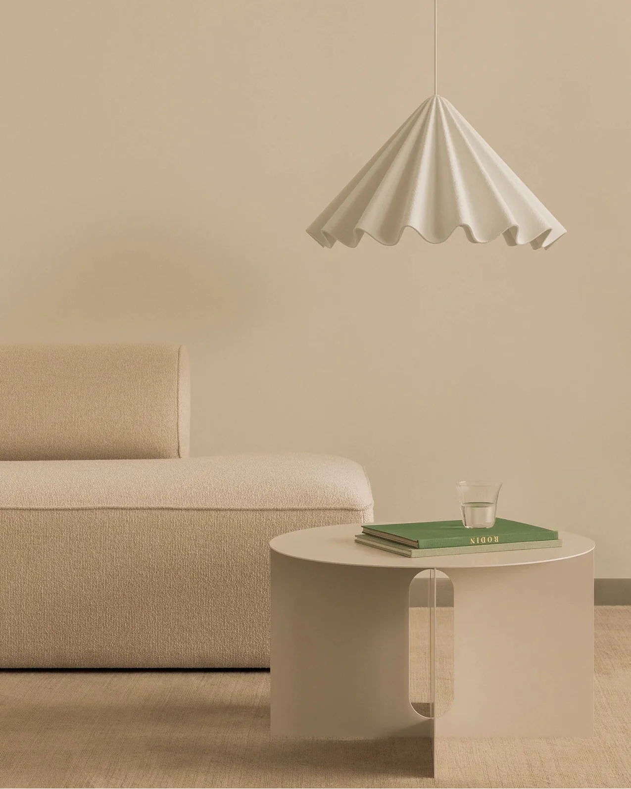 pleated cone pendant above a minimalist side table