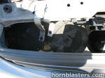 Two disc horns mounted behind grille silver brackets 2001 Toyota Corolla Nathan AirChime K5LA gallery photo 11