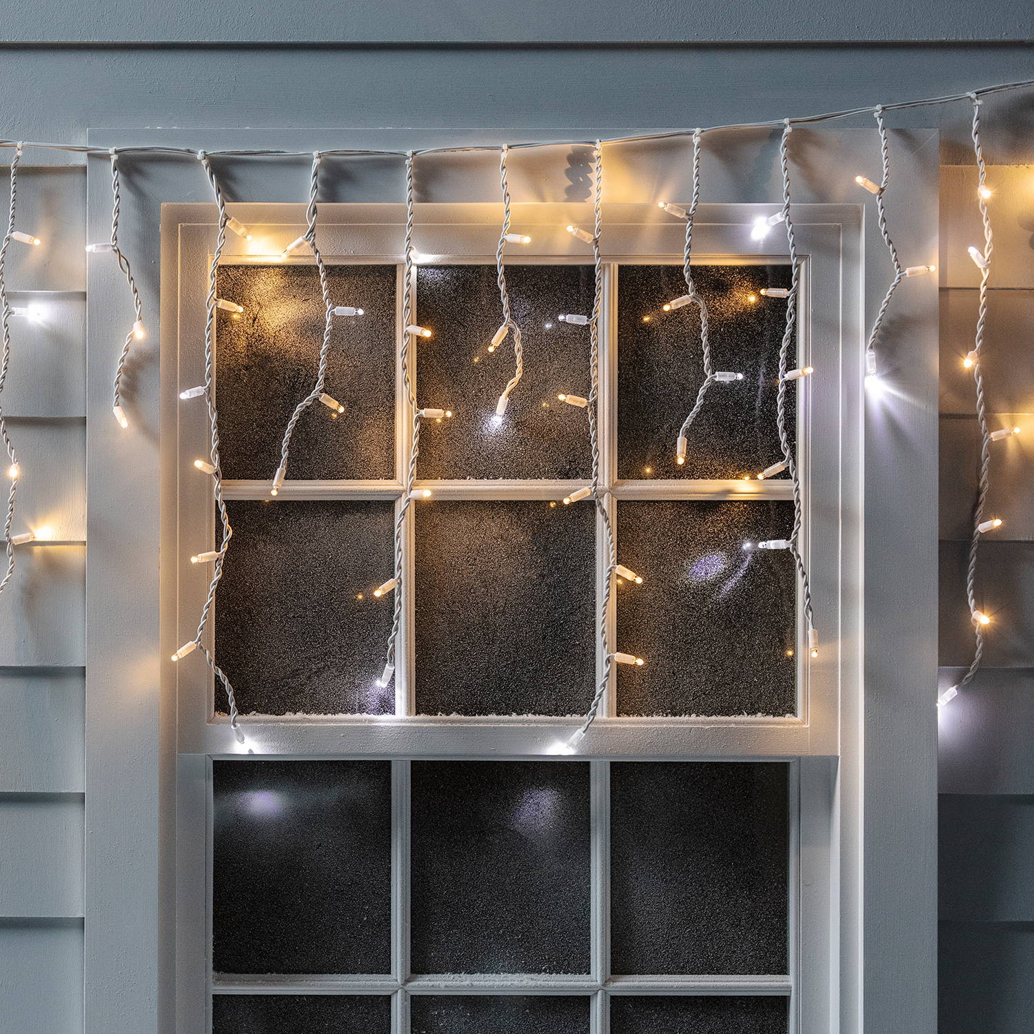 A string of outdoor warm white icicle lights 