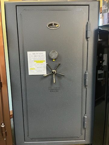 BROWNING DELUXE 49T BROWNING GRAND 33 gun safe exterior with sale price tag on door - SES spring cleaning sale
