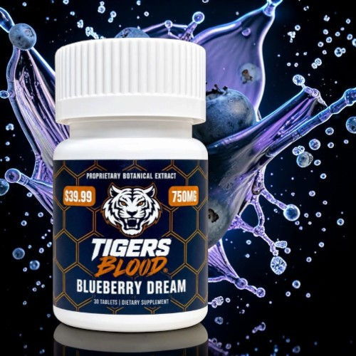 Bottle of Tigers Blood Blueberry Dream with a colorful background.