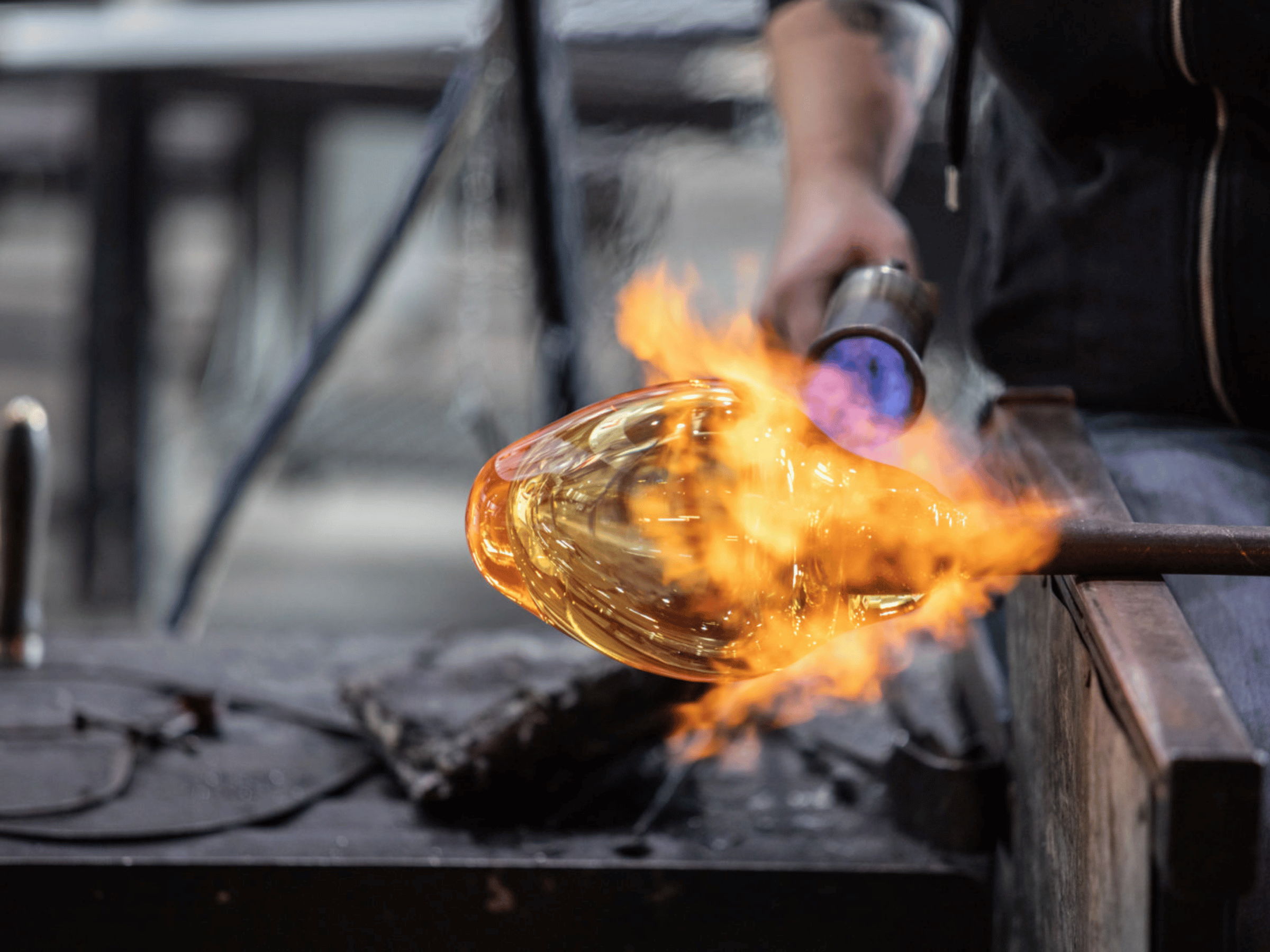 glass blowing glass circle design with blow torch and fire