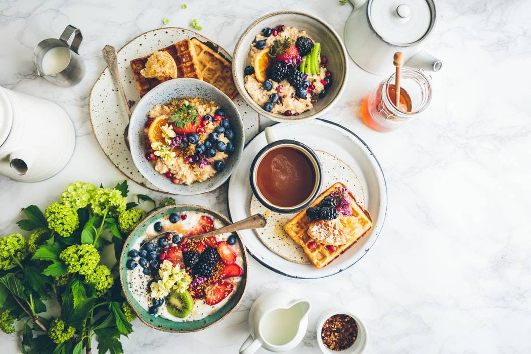 A Table Of Breakfast Foods