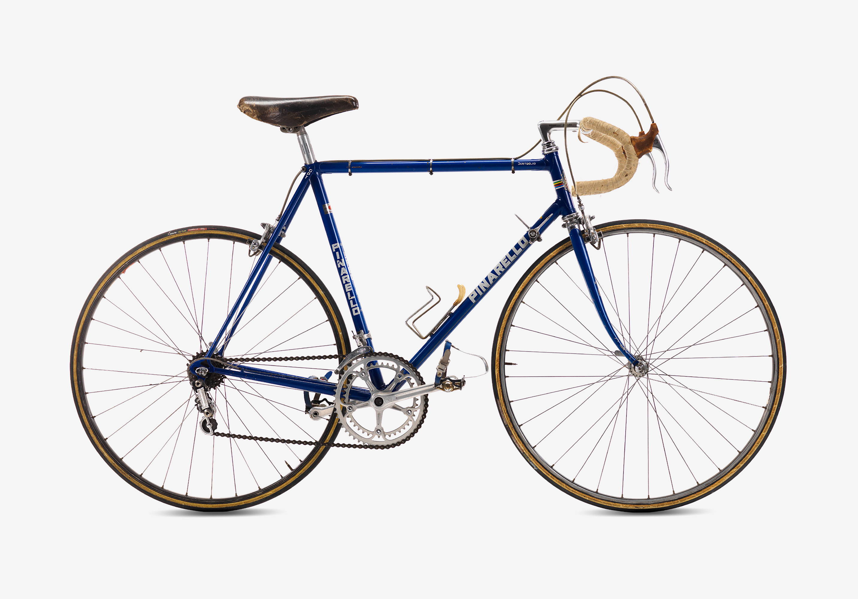 Photograph of a blue vintage Pinarello road bike with classic Campagnolo Super Record groupset