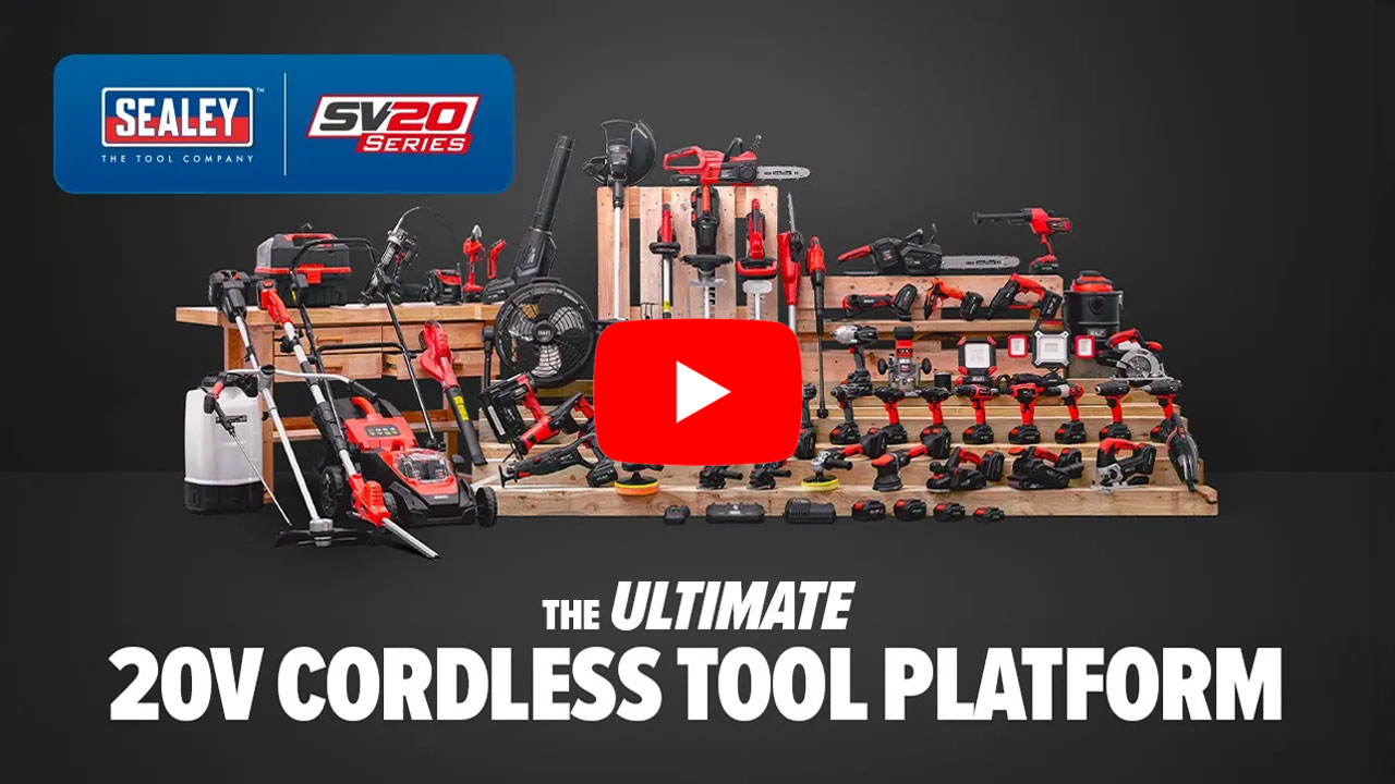 Tools displayed on a platform, promoting a 20V cordless tool system.