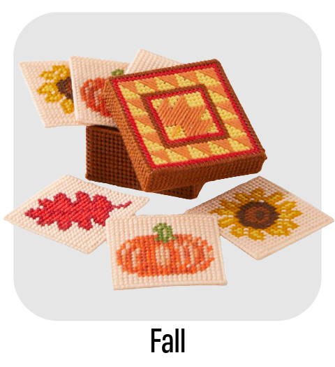 Fall. Image: Herrschners Fall Welcome Coasters Plastic Canvas Kit.