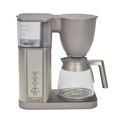 Coffee maker with a glass carafe and a water reservoir.