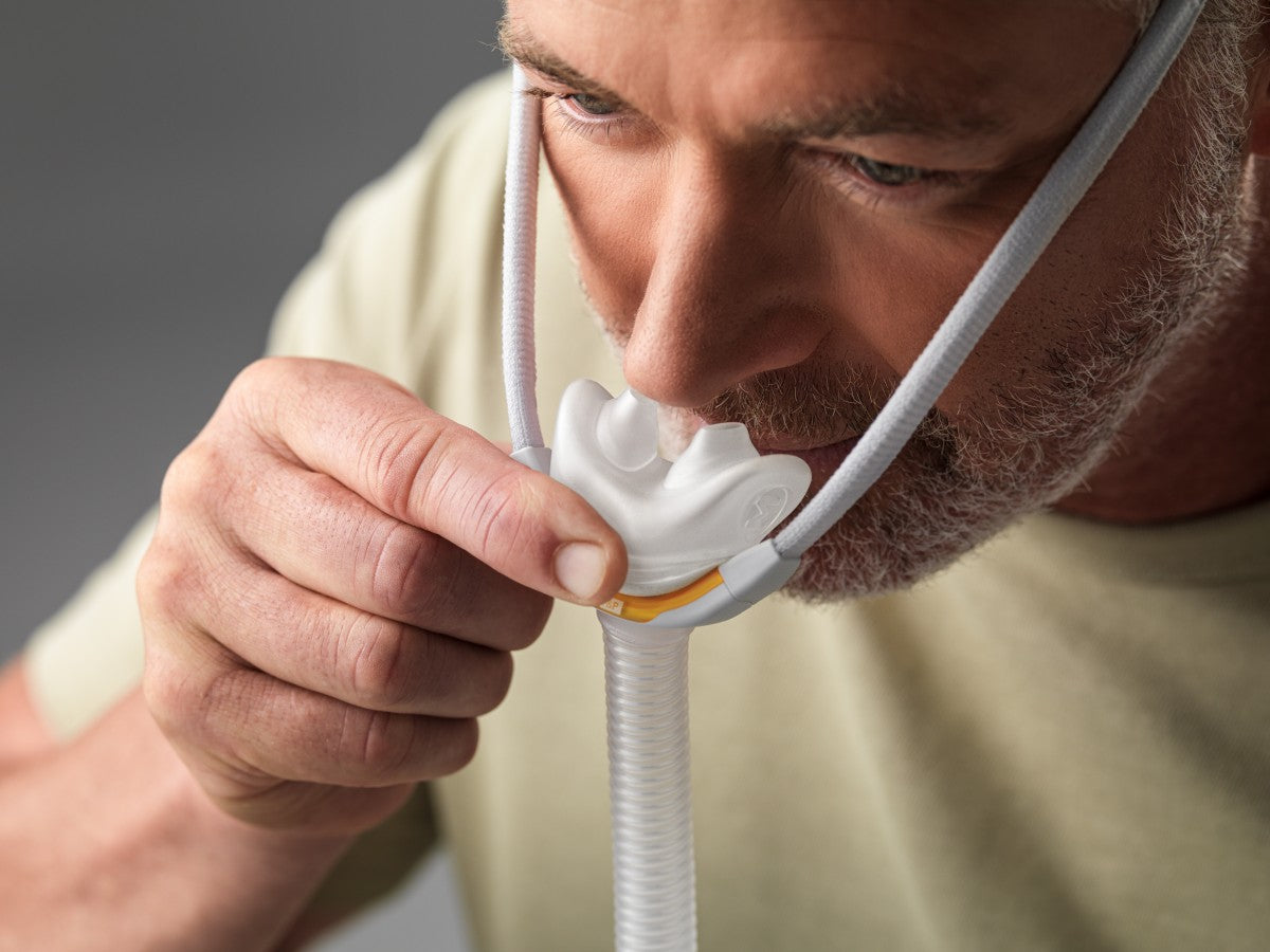 Top View of Man Wearing Fisher & Paykel Solo Nasal Mask W/ Headgear 