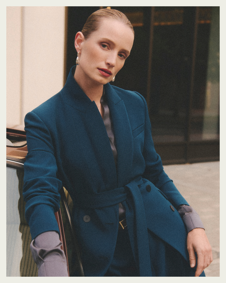 Model wearing teal suiting