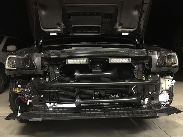 Front install view triple Shocker XL train horn trumpets dual LED light bars bumper removed grille Kristin's 2016 Subaru WRX gallery photo 2