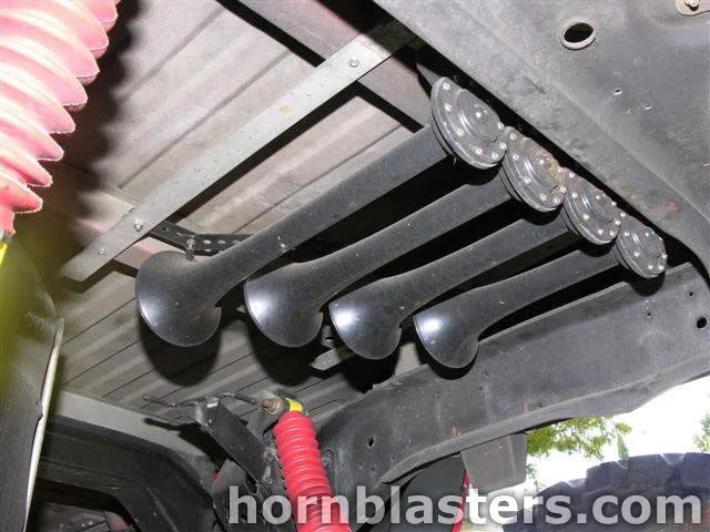 Front-side view of Rick's 1999 Dodge Ram 1500 train horn installation