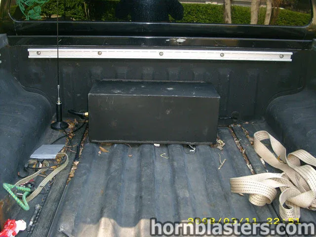 Angled front detail of Shawn's Nissan Frontier grille and bumper with Shocker XL install context photo 4