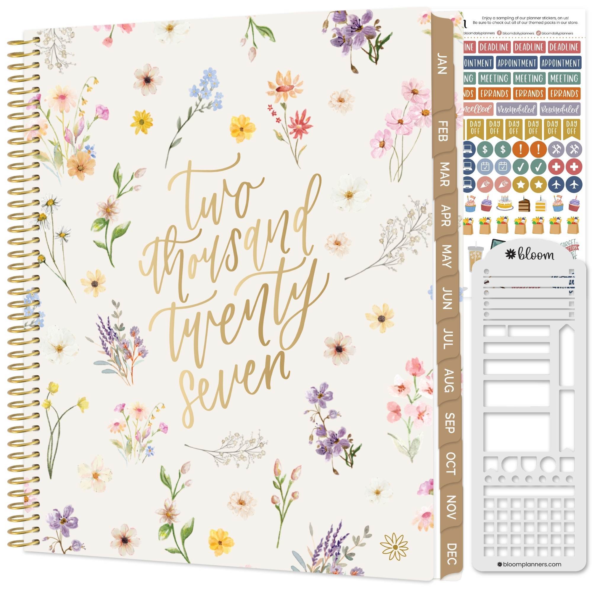 A 2027 planner with a cream background and pastel pressed flower pattern with a stencil and sticker sheet 