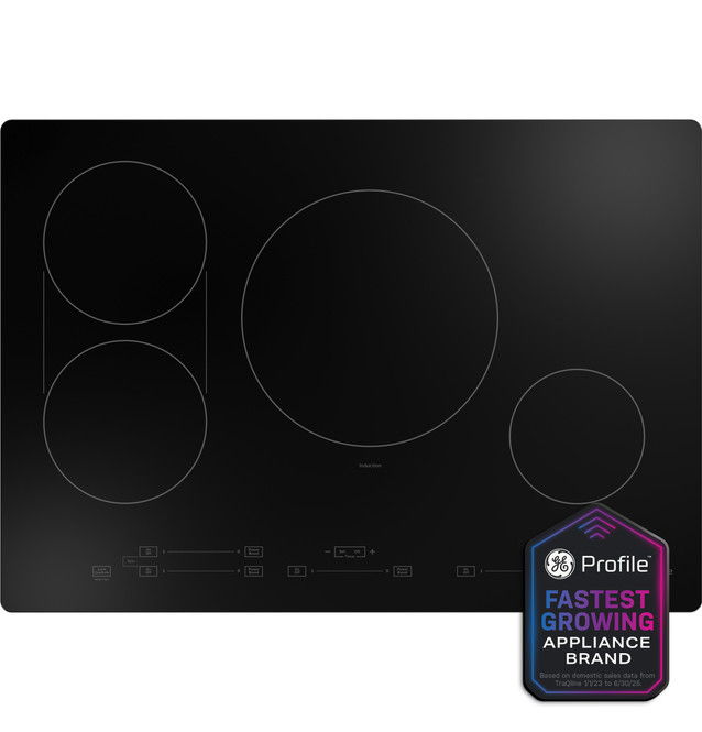 Black electric cooktop with four burners and award badge.