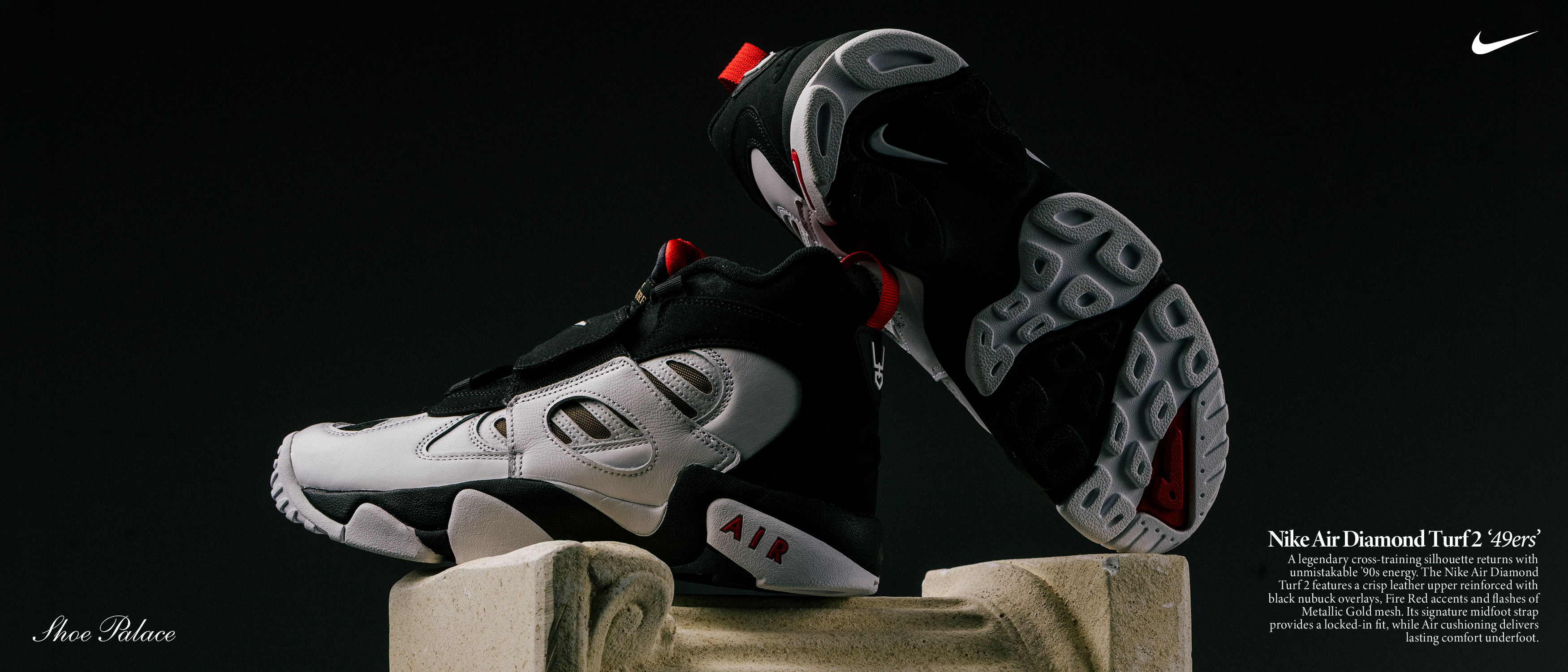 A pair of Nike shoes displayed against a dark background.