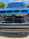 Front close-up metallic blue Tundra grille removed four black train horns mounted in front of radiator solenoid wiring Brian's Conductor's Special 228H install gallery photo 2