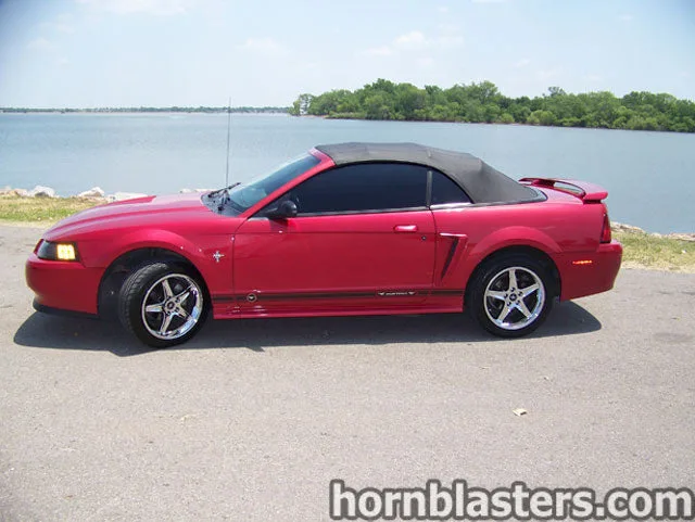 Side profile of 2002 Ford Mustang with Shocker XL train horn install HornBlasters gallery photo 2