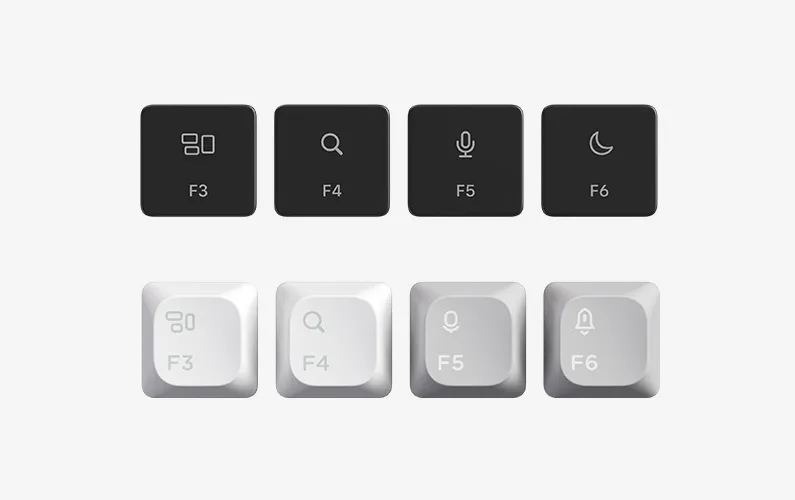 Keyboard keys in black and white, with various icons representing functions.