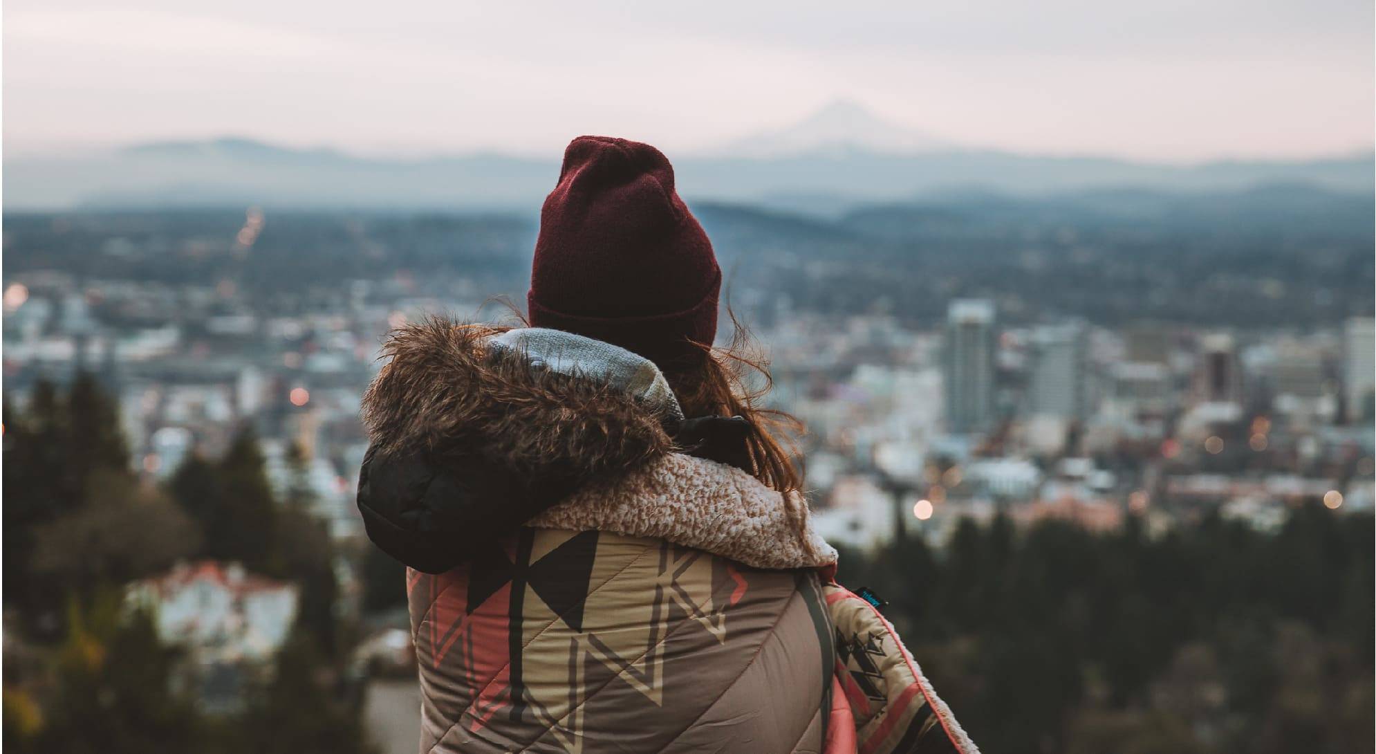 Girl looking over Portland from Pittock Mansion using Puffy Sherpa Blanket Lomoro