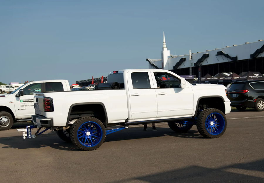 Exterior three-quarter view of Chris' 2017 GMC Sierra 1500 with HornBlasters Shocker S6 544K Nightmare Edition train horn kit featured customer install gallery photo 1