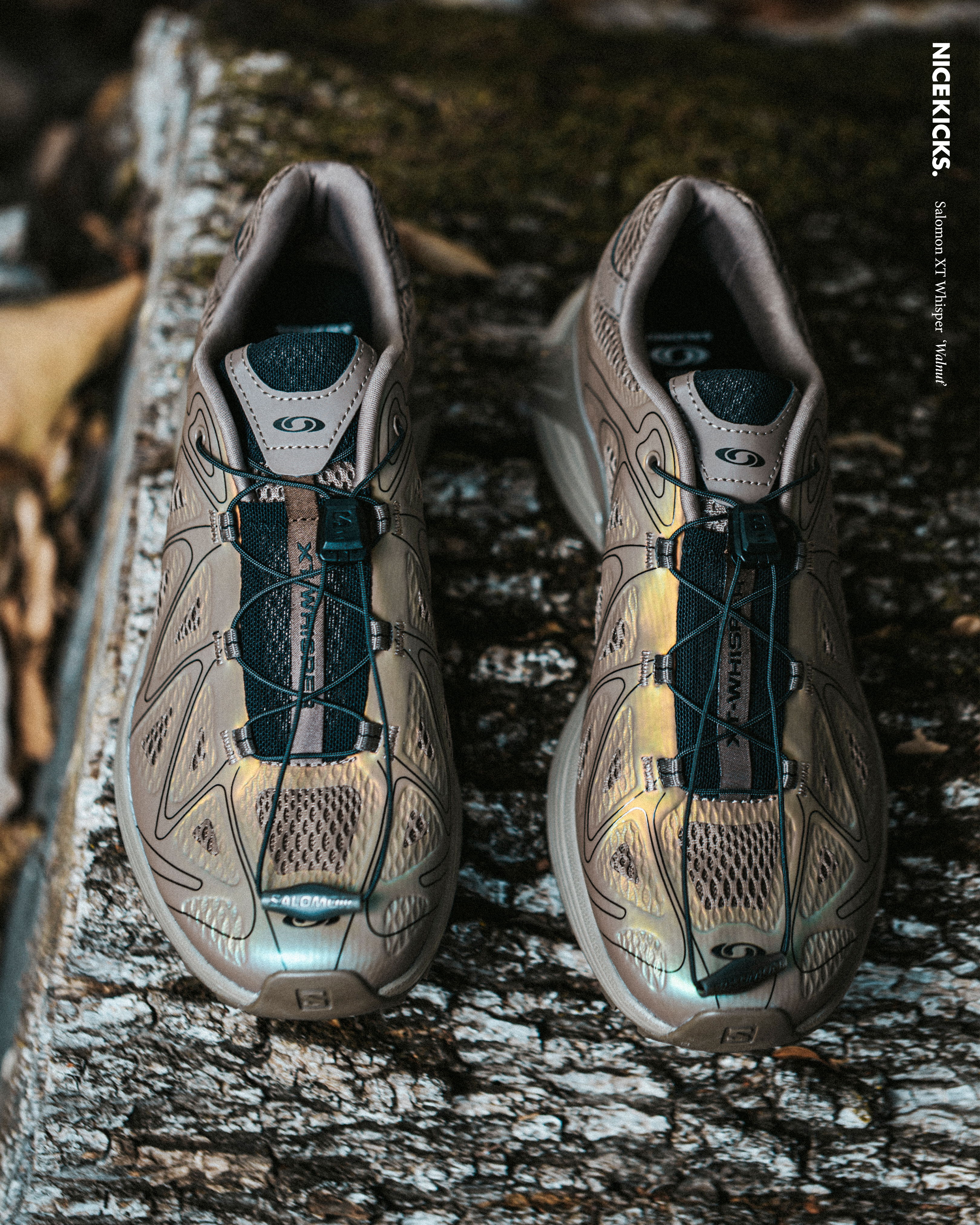 A pair of stylish, modern sneakers on a wooden surface.