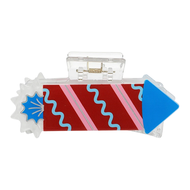 Colorful clutch bag shaped like a rocket with decorative elements.