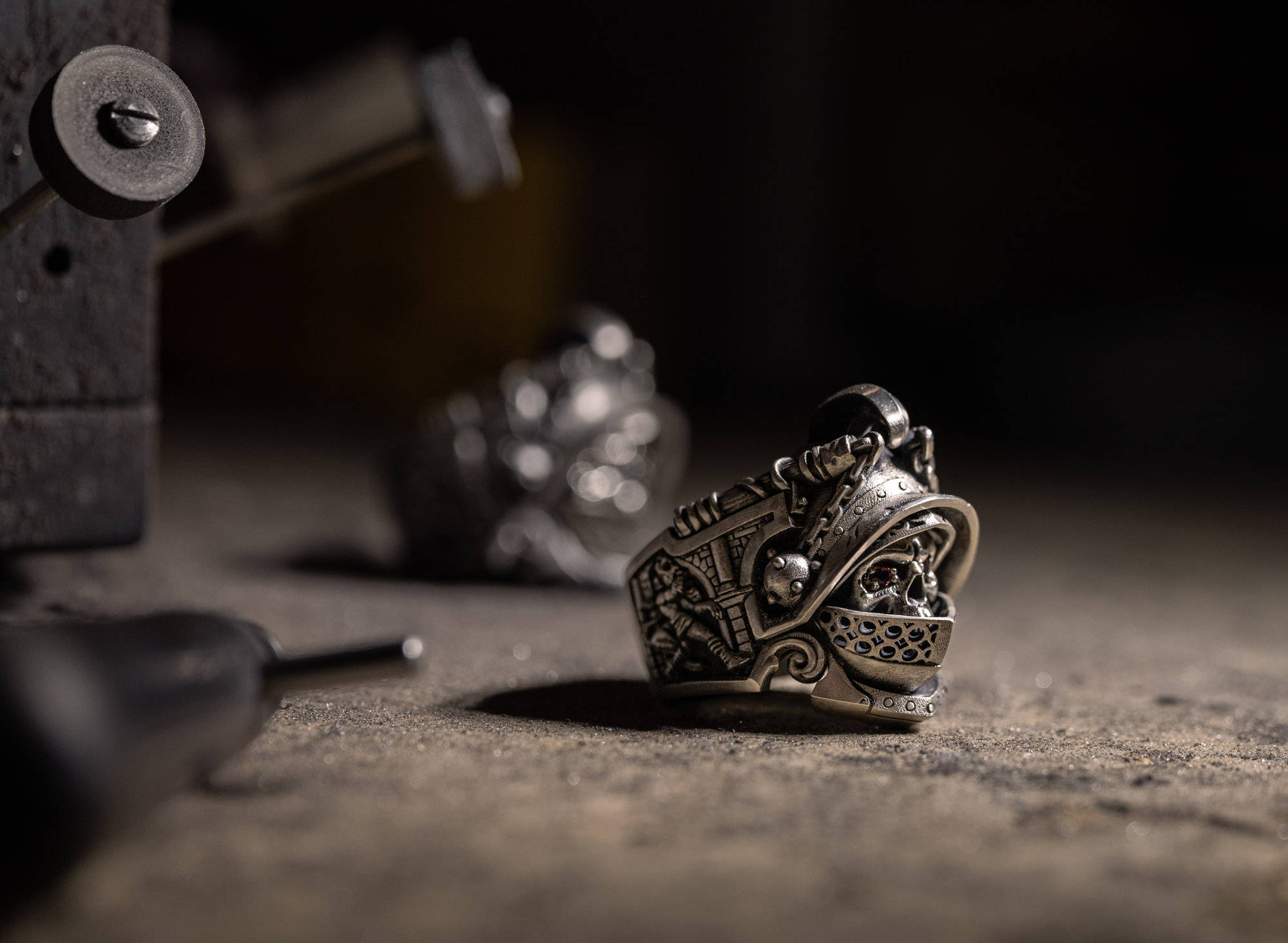 A Rudiarius Ring sits on a jeweler's bench