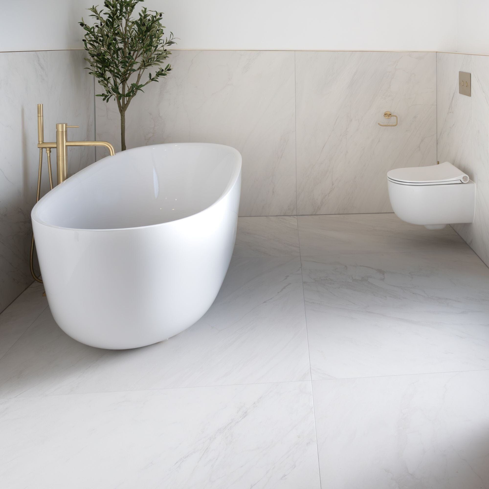 Modern bathroom with a freestanding tub and minimalist decor.