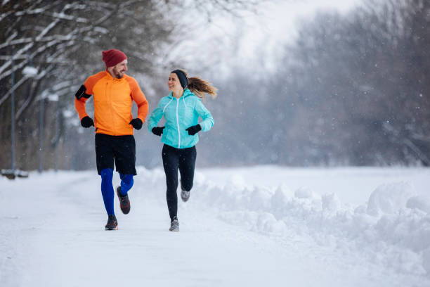 Couple running during winter. Winter Running.