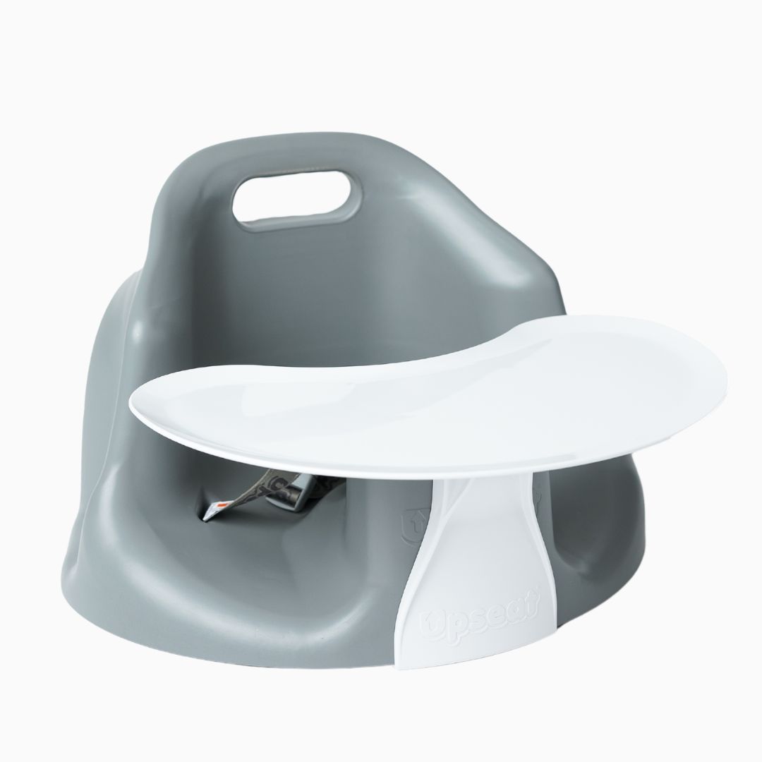 Gray baby seat with a white tray attached.