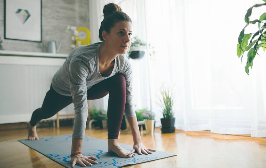woman doing lunge in yoga