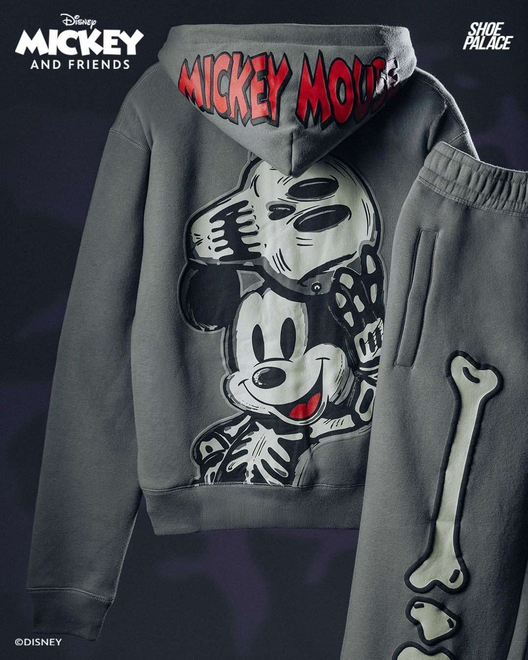 Mickey Mouse-themed hoodie and sweatpants with skeleton graphics.
