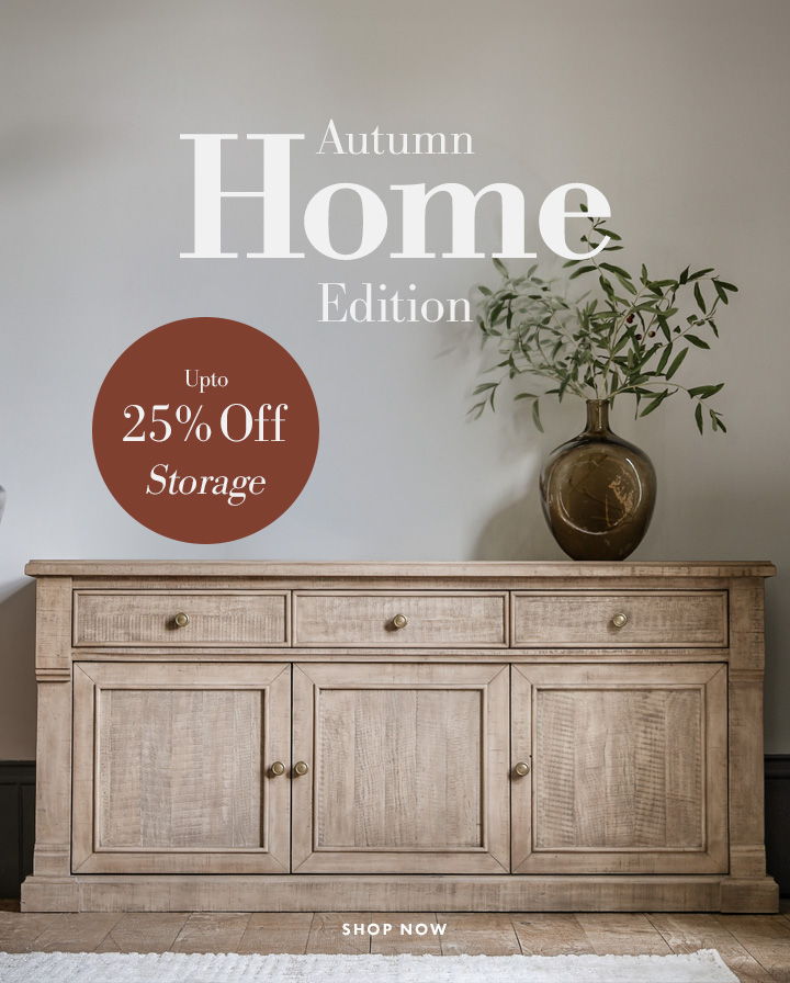 A wooden sideboard with a vase and promotional text for autumn storage sale.
