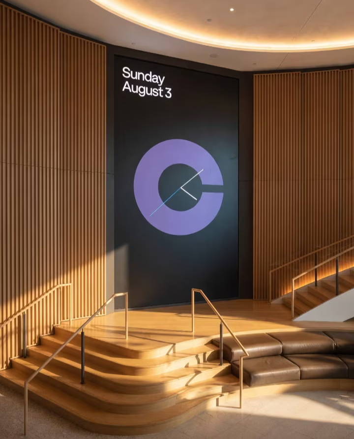 Modern interior with a circular graphic and text displaying the date.