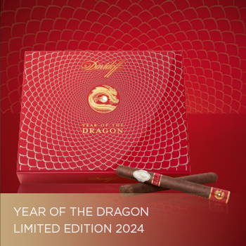 Year of the Dragon Limited Edition 2024 cigar box with crossed cigar lying in front of it.