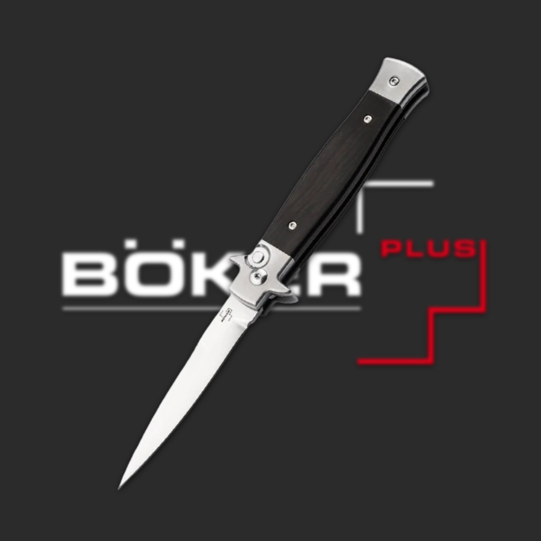 Böker Plus knife with a sleek design and black handle on a dark background.