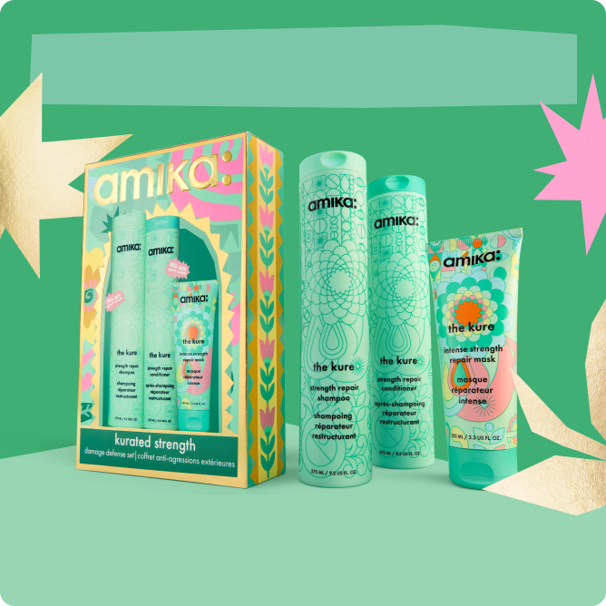 Amika hair care products in a colorful packaging on a green background.