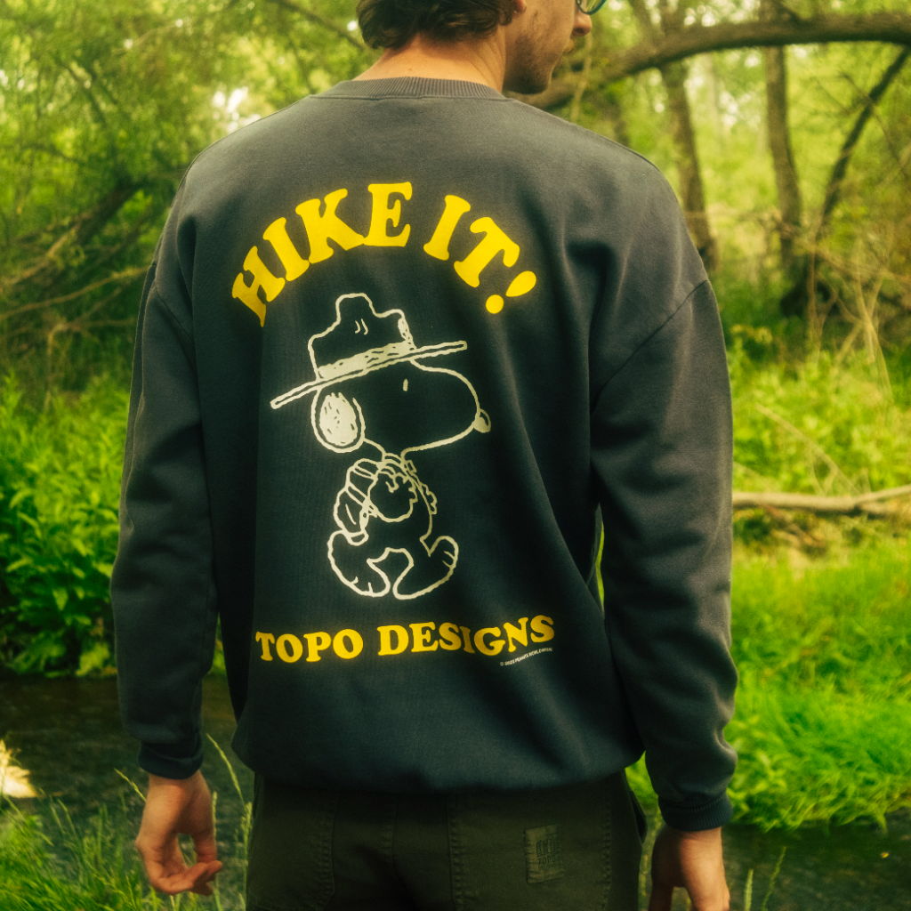 Person wearing a sweatshirt with 