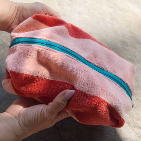 Finished towel pouch, bag closed showing the zipper